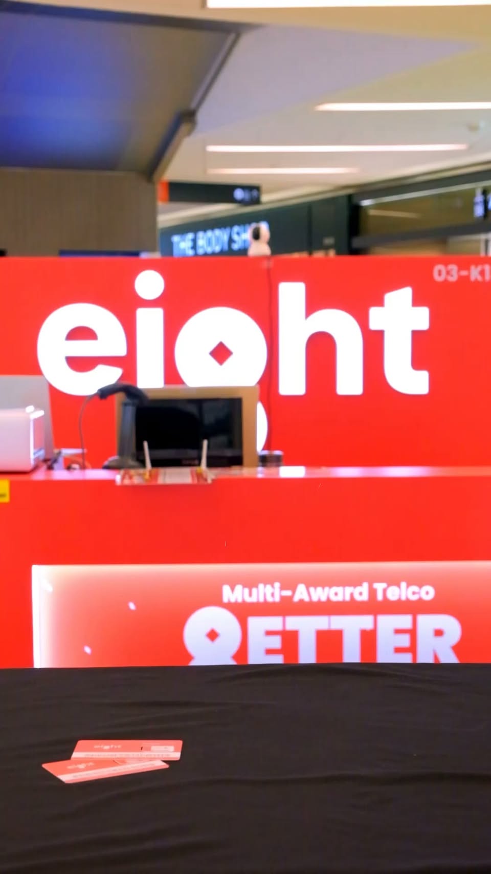 Eight Telecom at The Clementi Mall showcasing HONOR Magic V6, Insta360 Link 3, and 4K Pocket camera