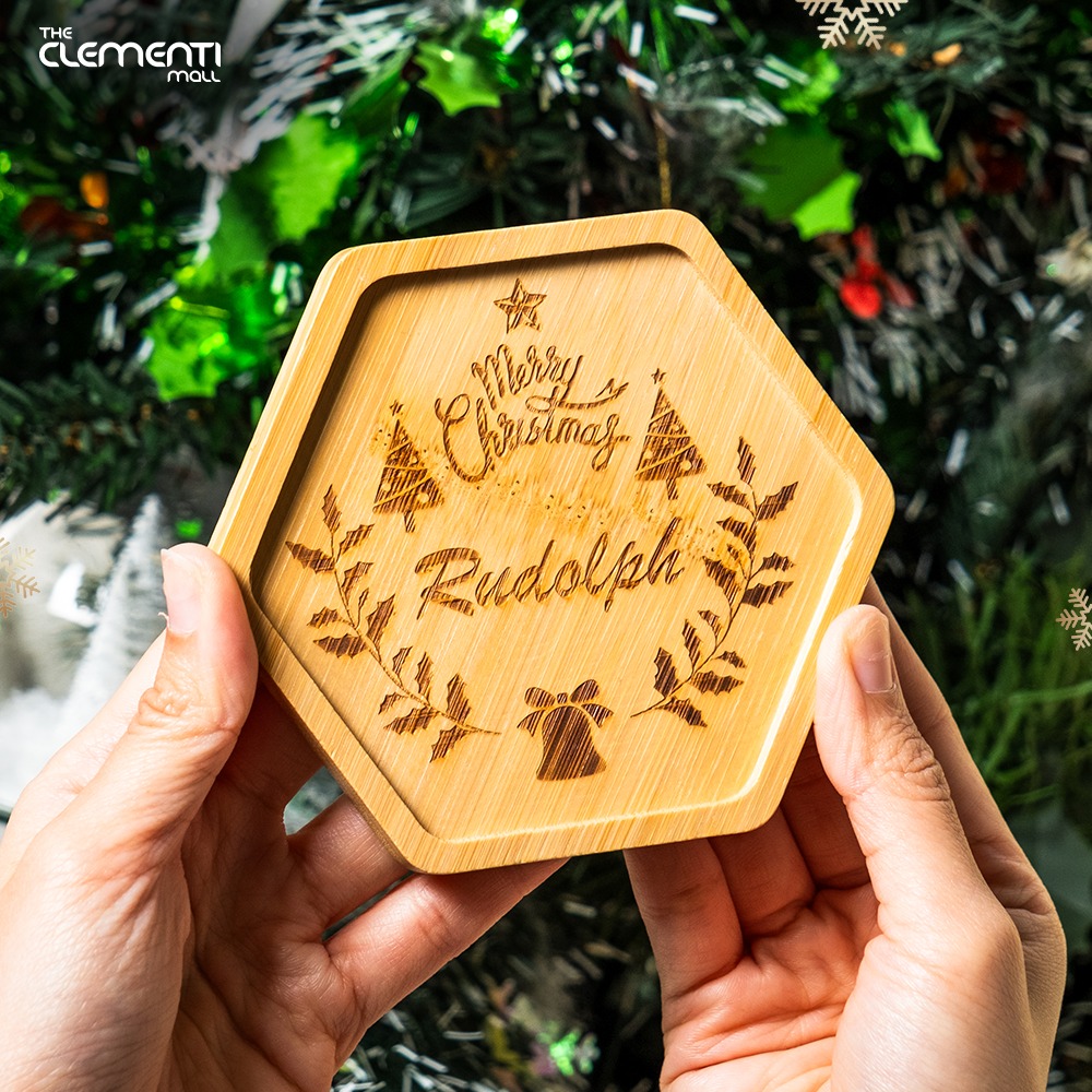 Hand-decorated Christmas coaster with holiday motifs