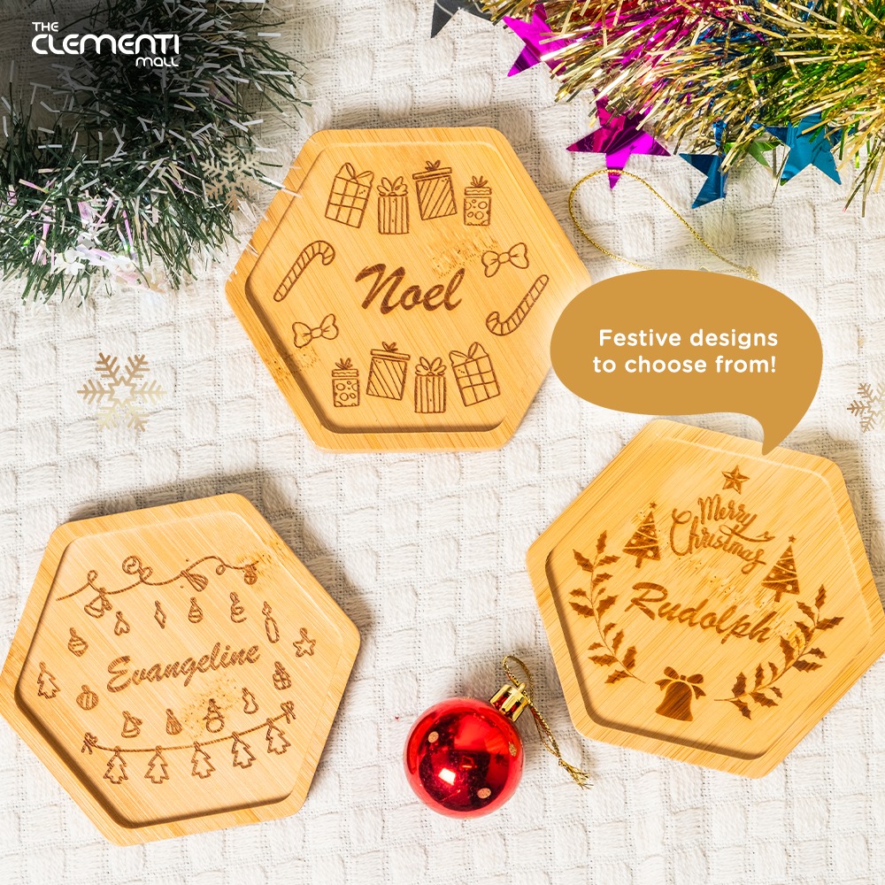 Finished Christmas coaster displayed on a desk with festive decorations