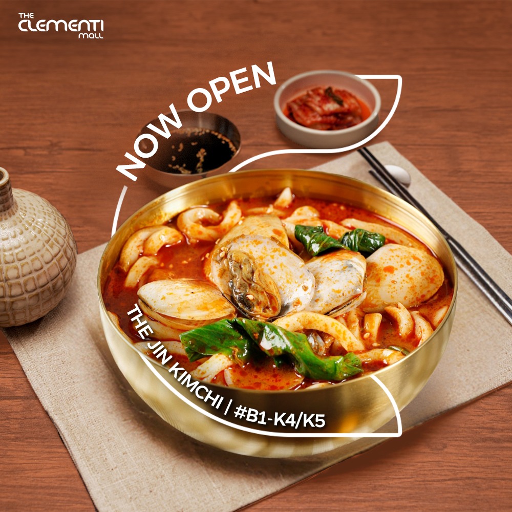 A selection of delicious Korean dishes, including a steaming bowl of kimchi stew and a galbi pork belly set, served fresh at THE JIN Kimchi.