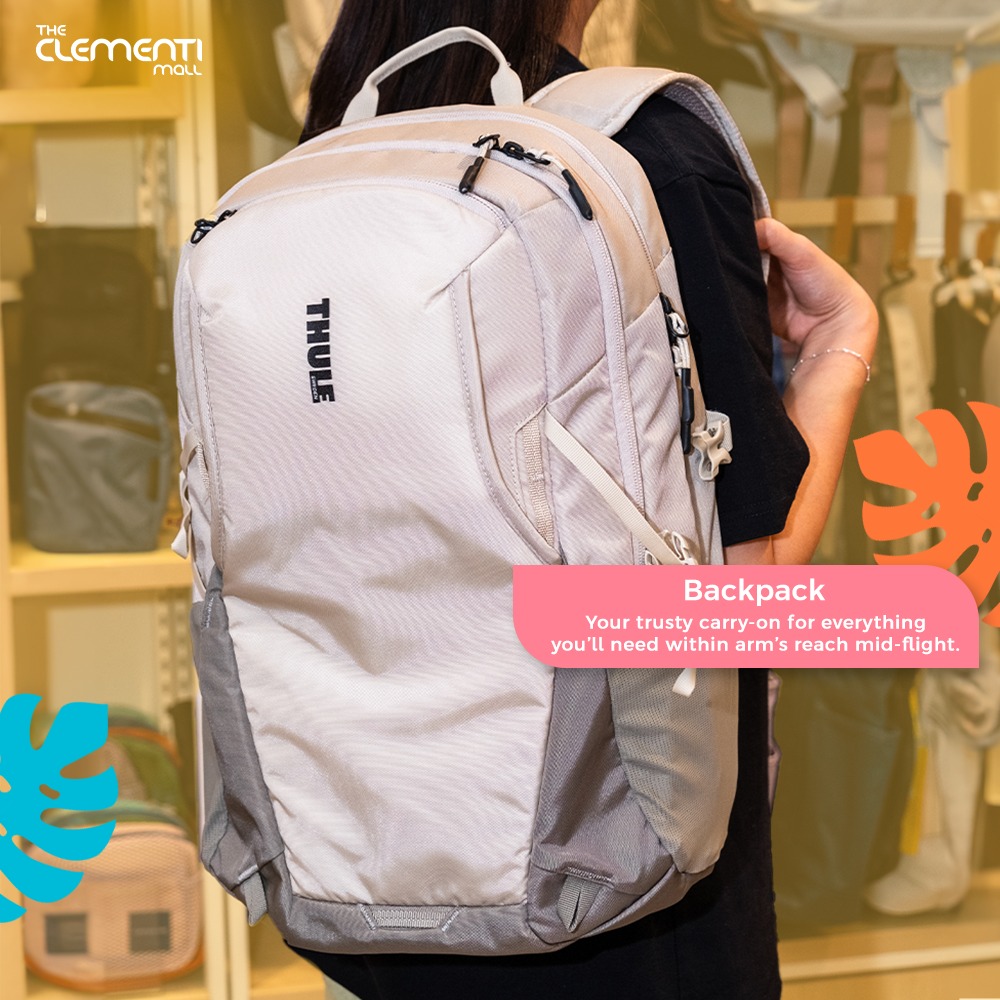 A collection of travel essentials for a trip