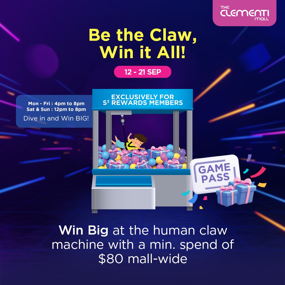 Shoppers enjoying the human claw machine event