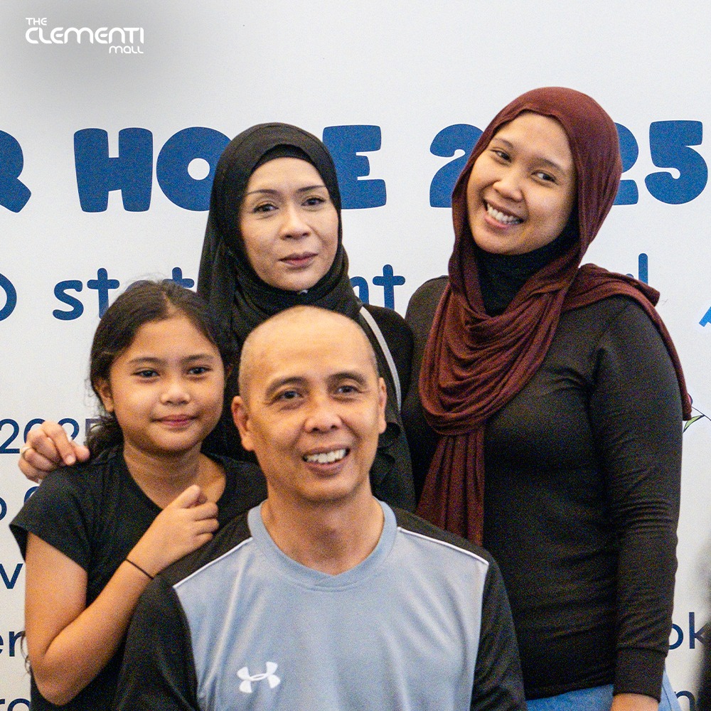 A volunteer getting their head shaved for charity.